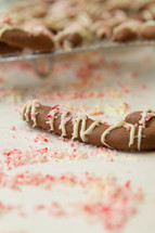 peppermint on a candy cane cookie 