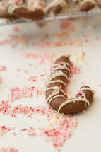 peppermint on a candy cane cookie 