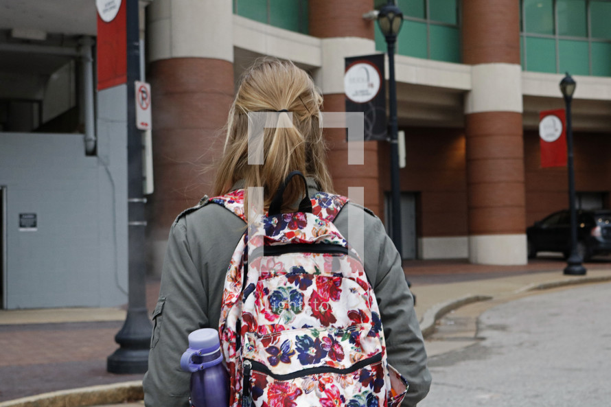 female student walking to class 