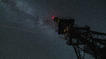 Milky way galaxy over communication tower Time lapse
