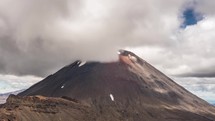 Dramatic clouds sky over volcano mountains Mount Doom in Tongariro National Park nature in New Zealand Time-lapse
