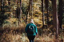 woman hiking in the woods 