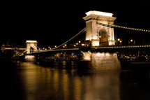 bridge over a river at night 