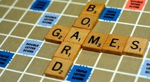 words board games on a scrabble board 