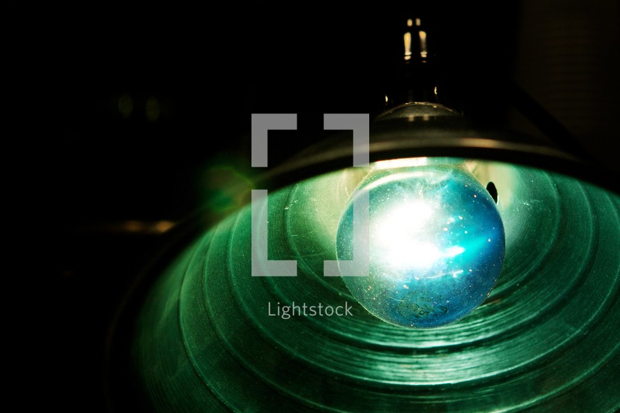 Blue lightbulb in light fixture