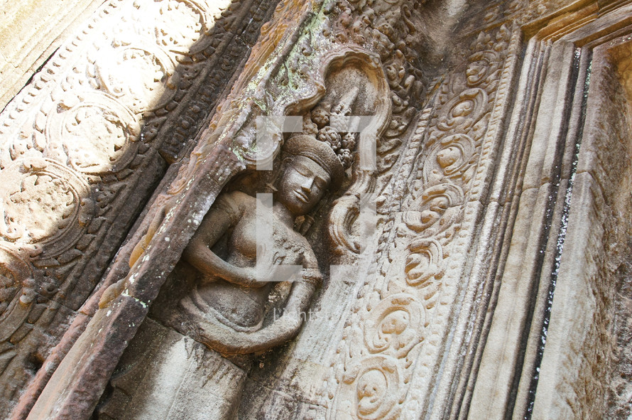 carved into the side of a stone temple