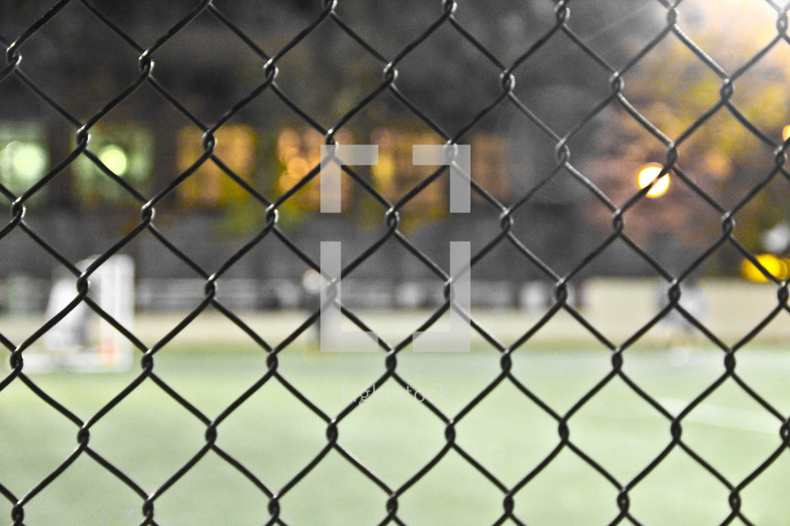 chain link fence and baseball stadium 
