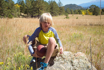 a boy child exploring nature 