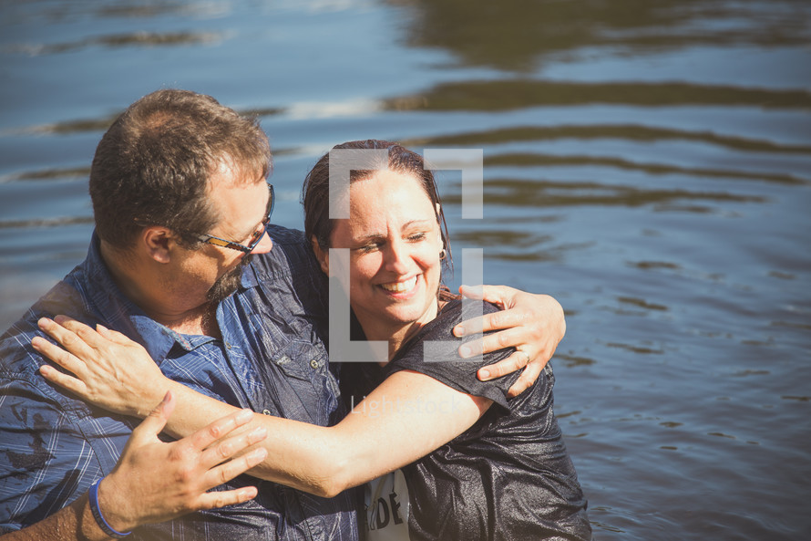 hugs after being baptized 