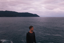 a man standing on the shores of Tasmania 