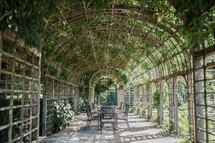 outdoor seating under an arbor 
