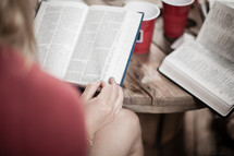 Reading Bibles at a Bible study 
