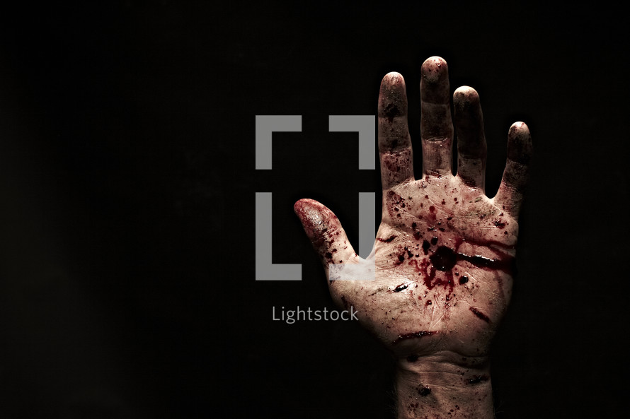 The bloody and nail-scarred hand of jesus. — Photo — Lightstock