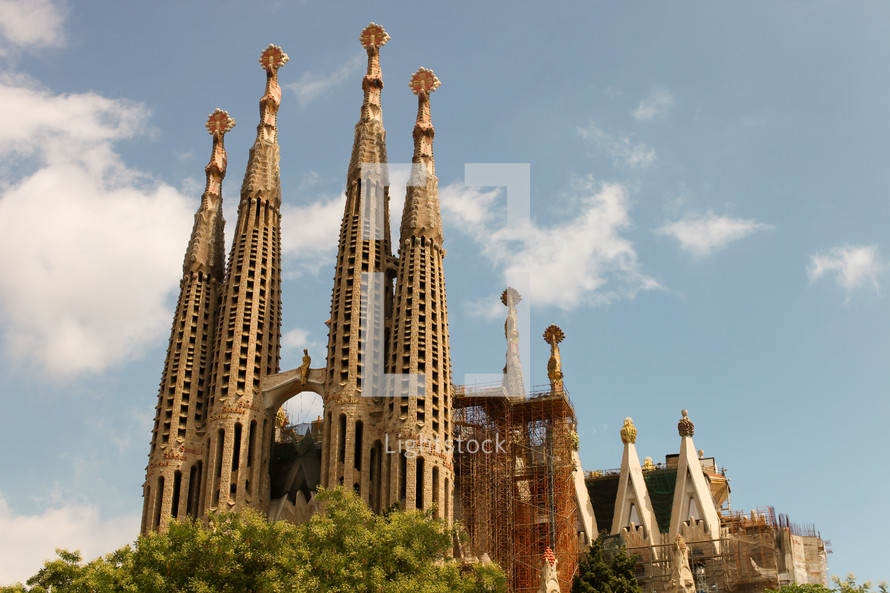 The Basílica i Temple Expiatori de la Sagrada Família, commonly known as the Sagrada Família, is a large Roman Catholic church in Barcelona, Spain, designed by Catalan architect Antoni Gaudí.