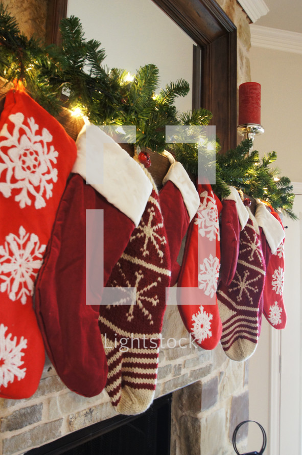Christmas stockings hung on a mantle 