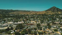 aerial view over a valley town 