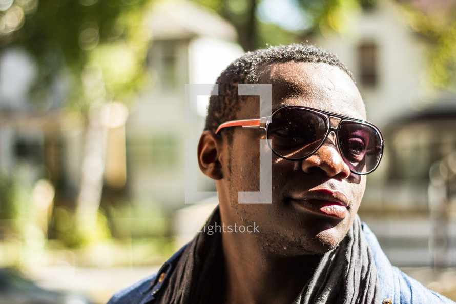 Black young man wearing sunglasses 