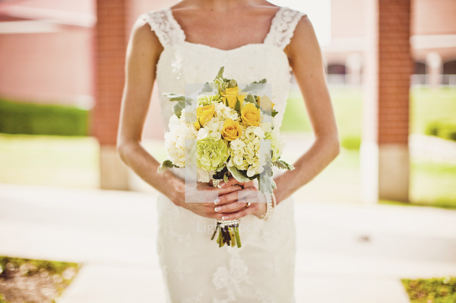 woman holding bouquet of flower - bridesmaid