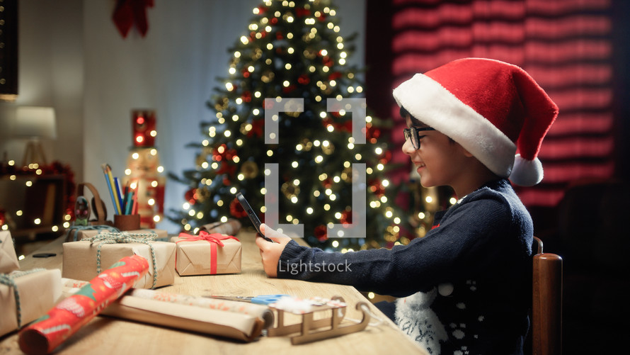 Italian Kid playing with his gift for Christmas Day 