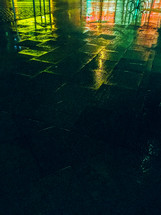wet sidewalk at night 