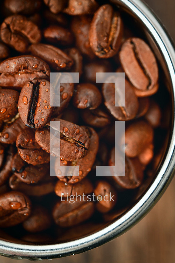Closeup Roasted coffee beans in Coffee Machine Filter