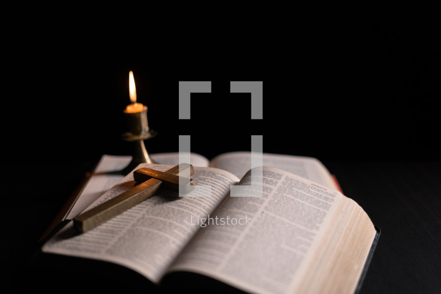 Bible and candlelight