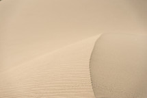 Sand dune and blowing sand.