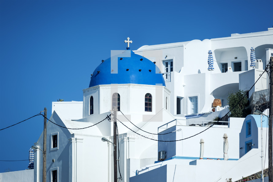blue dome on a church in Santorini, Greece 