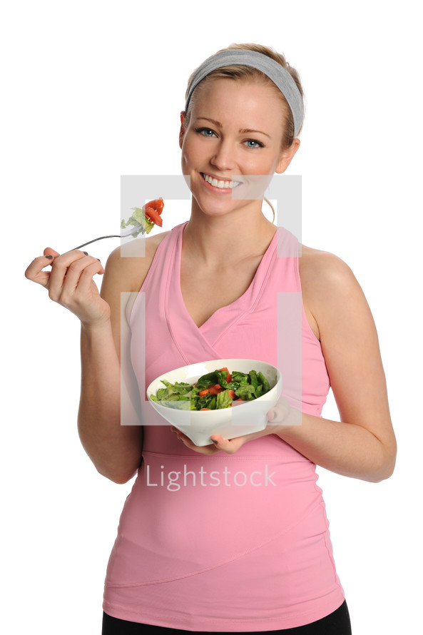 woman eating a salad 