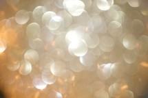 gold bokeh lights background for New Year's Eve