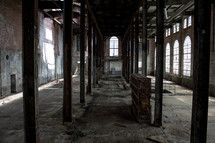 dusty abandoned warehouse building interior 