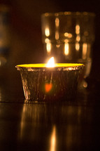 a candle in tin foil 