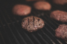 hamburgers on a grill 