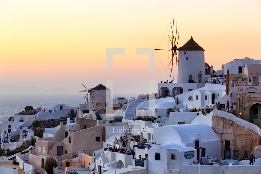 Sunset of Oia village in Santorini island photographed from a high point of view