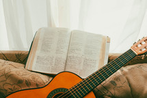 open Bible and guitar 