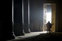 Jesus standing in the doorway of a temple 