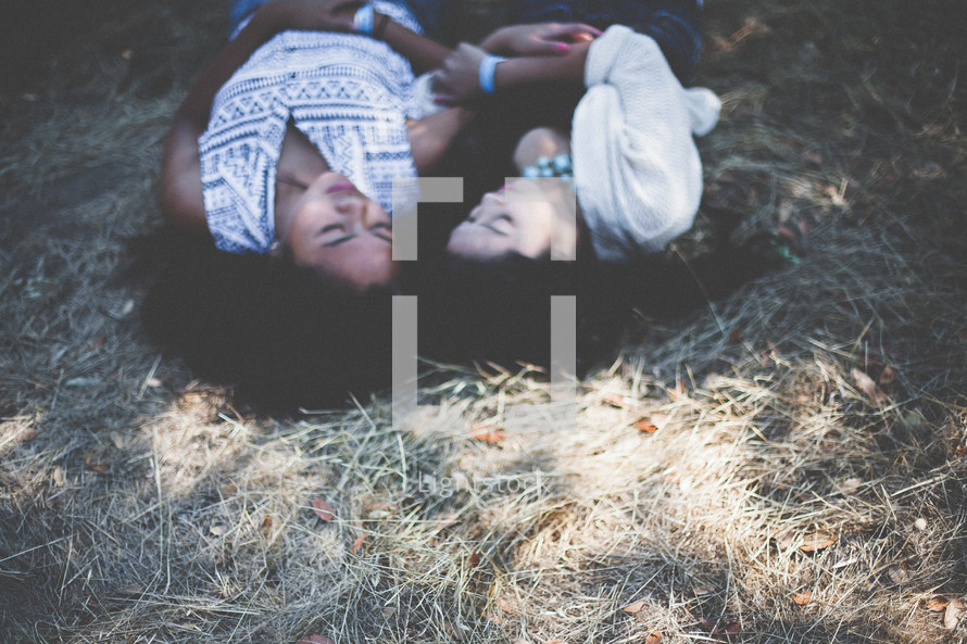 friends lying in the straw 