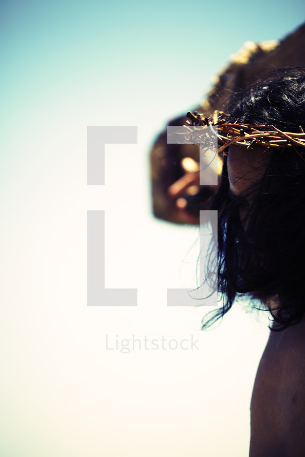 Jesus on the cross with a crown of thorns on his head