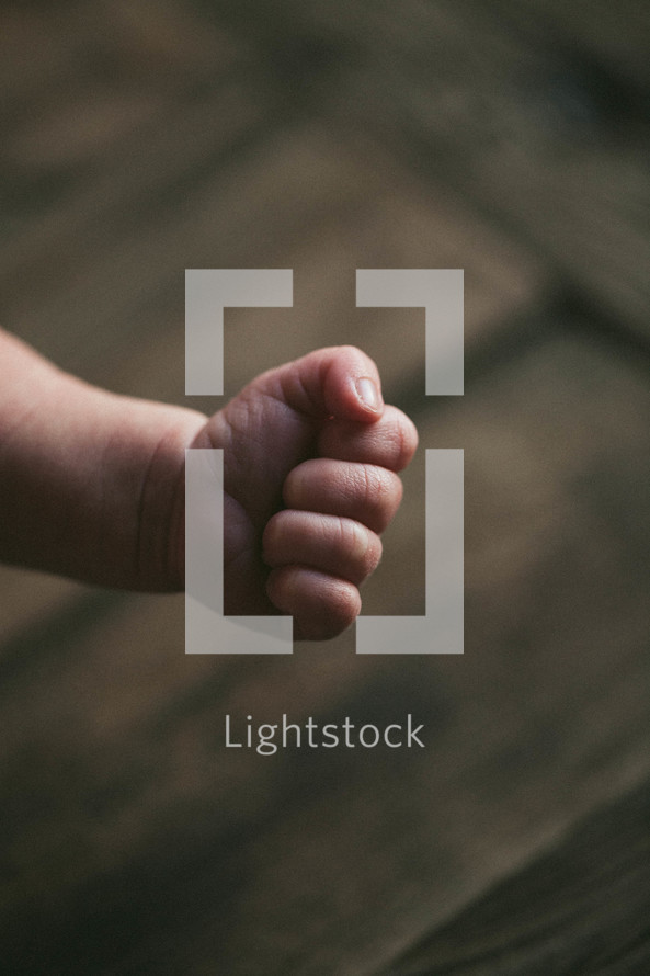 fist of a newborn infant