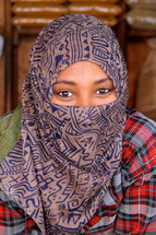 Eyes of a shrouded Ethiopian muslim woman [For more search Ethnic Face Smile]