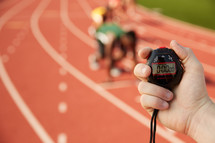 timing a race with a stopwatch 