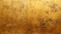 Grunge gold leaf foil texture background. 