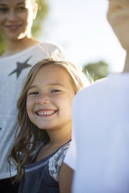 portrait of smiling children outdoors 