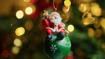 Santa Claus on Decoration Ball for Christmas celebration 