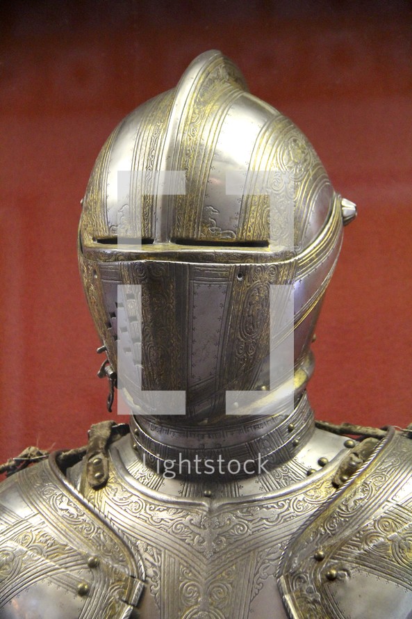 A suit of decorated armor featuring the breast-plate and helmet