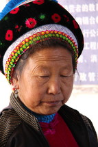 elderly woman in a hat