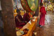 Buddhist monks praying 