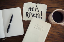 His Is Risen!, journal, pen, Bible, cover, wood table, Easter, morning devotional, coffee, mug, words, lettering, note, piece of paper, paper 