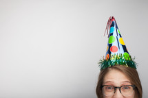a woman in a party hat 