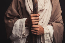 Joseph holding his shepherds staff 